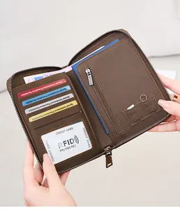 Detail of RFID blocking leather passport wallet showing card slots and SIM card pockets