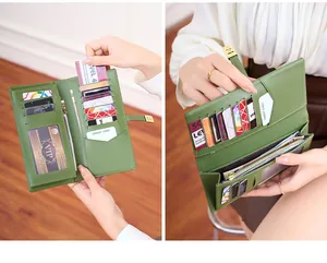 Detail view of avocado green leather wallet showing 10 card slots and zipper pocket