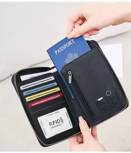Detail view of RFID blocking passport holder with credit card slots and SIM card storage