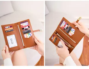 Detail view of brown RFID protected slim wallet featuring multiple card slots and zipper pocket