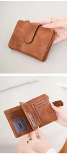 Detail of a brown RFID wallet featuring multiple card slots and dedicated SIM card holders