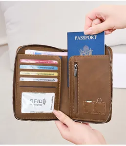 Detail of RFID travel wallet showing passport slot, SIM card slots and zipper pocket