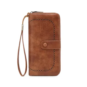 Vintage brown RFID blocking long wallet for women with hollow design and wrist strap