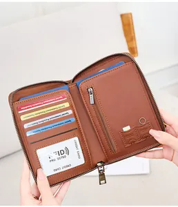 Detail of RFID blocking leather passport wallet with card slots and SIM holders