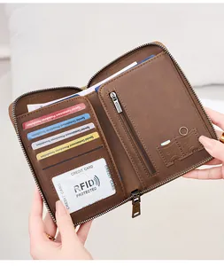 Detailed interior of RFID leather passport wallet showing card slots and zipper pocket
