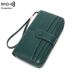 Portafoglio donna lungo verde scuro con protezione RFID e cerniera dorata