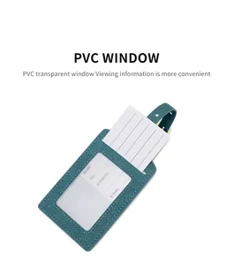 Detail of teal PU leather luggage tag with lychee texture and adjustable metal buckle