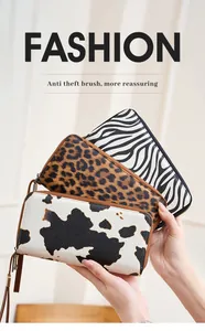 Portafogli lunghi RFID con stampe animalier mucca, leopardo e zebra e cinturini da polso