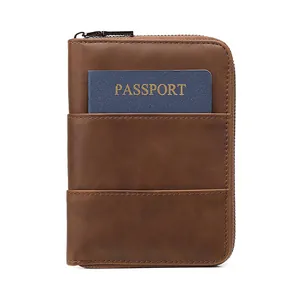 Vintage brown crazy horse leather RFID passport holder with secure zip closure and front pocket