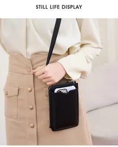 Vertical black lychee pattern leather phone bag with shoulder strap and front card slot