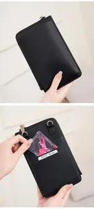Detail view of lychee leather crossbody phone bag with RFID protection card slots