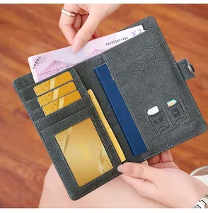 Macro view of RFID passport wallet interior showing multiple card slots and SIM card pockets