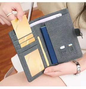 Detailed interior view of dark grey RFID passport wallet showing card slots and SIM holders