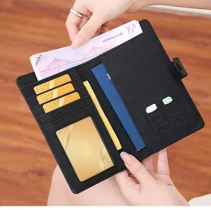 Macro view of RFID passport wallet interior with multiple card slots and leather texture