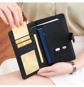 Detail of RFID blocking passport wallet interior with SIM card slots and card holders