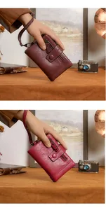 Detail of RFID women short wallets in brown and rose red PU leather with wrist straps