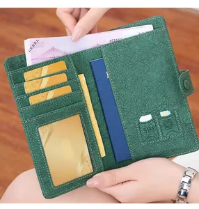 Inside view of RFID passport wallet showing SIM card slots and leather card holders
