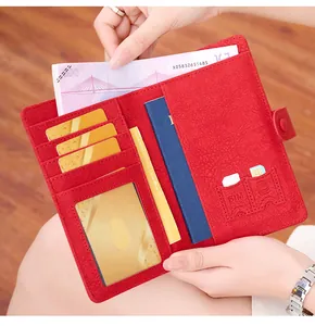 Detail showing the internal card slots and SIM compartments of this red RFID passport wallet