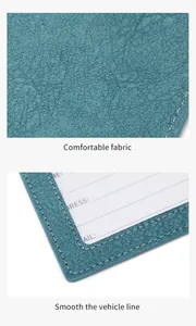 Detail of blue PU leather luggage tag showing litchi texture and neat white stitching