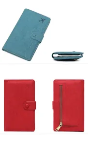 Detail view of RFID passport wallet with airplane logo, snap closure and back zipper pocket