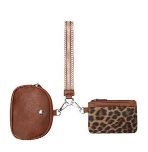 Detail view of brown PU leather coin purse and leopard print card holder set