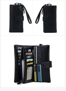 Macro detail of black RFID leather wallet showing internal card slots and wrist strap