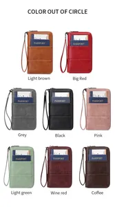 Detailed view of long RFID passport wallets in eight assorted leather colors with wrist straps