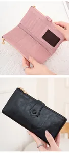 Detail of multi-card slots and secure dual zipper closure on a stylish long wallet