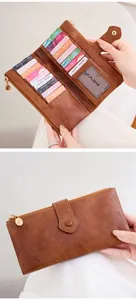 Brown long wallet detail showing dual zippers, card slots and荔枝 texture PU leather