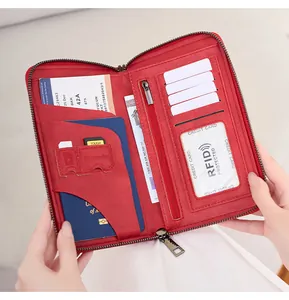 Interior detail of red RFID passport wallet showing multi-card slots and secure storage