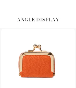 Détail du mini porte-monnaie en cuir orange avec texture grainée et fermoir doré chic