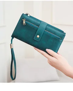 Portafoglio vintage in pelle verde scuro RFID con cinturino da polso e cerniera