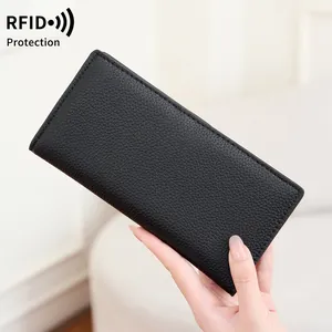 Minimalist black RFID blocking slim long wallet for women in pebbled leather finish