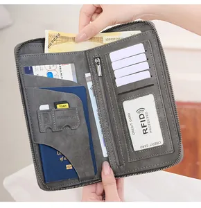 Detail of RFID blocking travel wallet with multiple card slots and passport compartment
