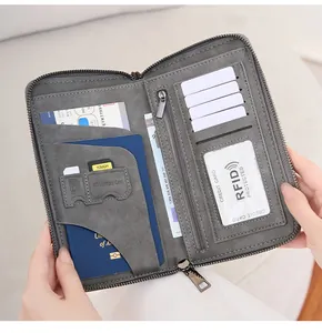 Detailed interior of gray RFID travel wallet showing passport slots and card holders