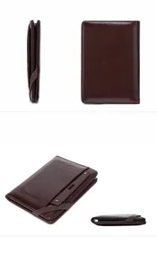 Detail view of brown leather RFID passport wallet with elastic strap and card slot