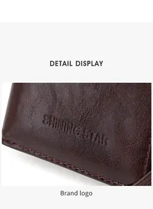 Detailed close-up of litchi texture brown leather with embossed Shining Star logo