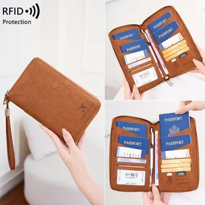 Brown vintage RFID blocking passport holder with zipper and multi-functional slots
