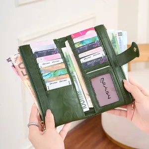 Women's dark green long leather wallet with double zipper and multi-card slot design