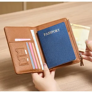 Internal layout of brown leather passport holder showing RFID slots and SIM card storage