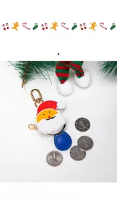 Mini Santa leather coin purse with golden hook and blue card holder detail view