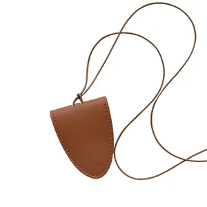 Brown lychee leather magnetic glasses holder with matching woven neck lanyard strap