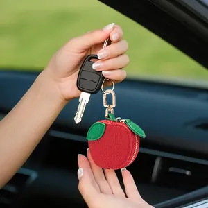 Red 3D apple fruit coin purse keychain with green leaves and gold hardware
