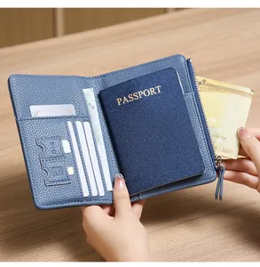 Blue lychee leather travel wallet with RFID blocking, passport slot, and SIM card holders