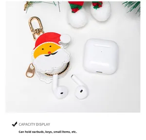 Detail of white leather Santa pouch interior holding earphones and small accessories