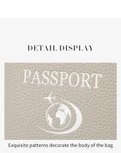 Detail display of beige RFID passport holder with pebble leather texture and printed logo