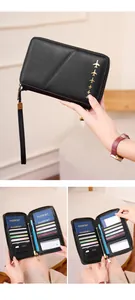 Detail of RFID travel passport wallet with airplane icons and multi-card storage slots