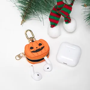 Llavero con colgante de calabaza 3D y mini funda para auriculares con mosquetón