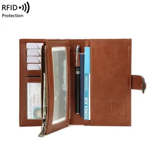 Καφέ δερμάτινο πορτοφόλι διαβατηρίου RFID με οργανωμένες εσωτερικές θήκες και υποδοχές