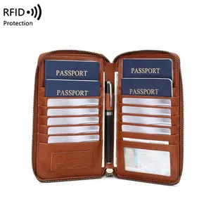 Brown leather RFID blocking passport wallet with multi-slot travel document storage